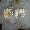 gold and silver bridal hair combs with leaves and clay flowers. handmade in toronto canada by blair nadeau bridal