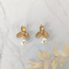 brass flower stud earrings with pearl drops