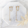 gold chain ear huggers with freshwater pearl drops. modern bridal jewelry
