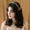 Hand wired round glass pearl double banded coronet headband with various sized pearls in ivory or white. Attached to the head with either a ribbon (included) or bobby pins (not included).  Available in silver, gold  or rose gold. made by hand in toronto canada by blair nadeau bridal adornments