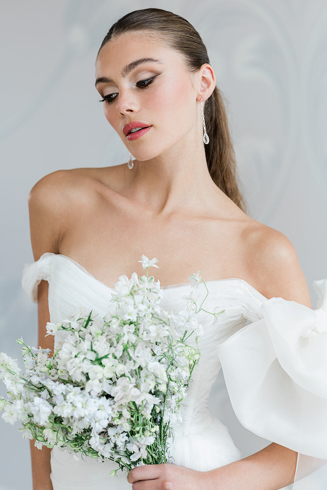 silver crystal teardrop chain dangle earrings for weddings made in toronto canada