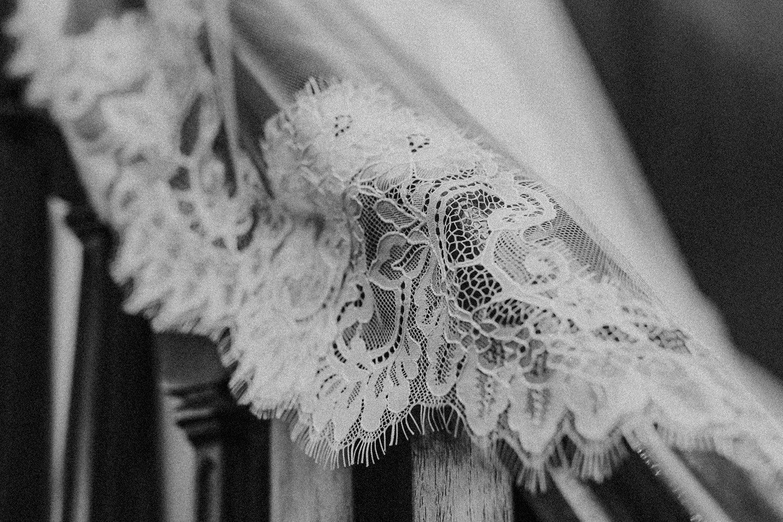 Close-up of a lace wedding veil with a blurred background