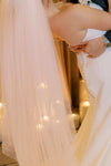 Close-up of a couple holding hands with a blurred background