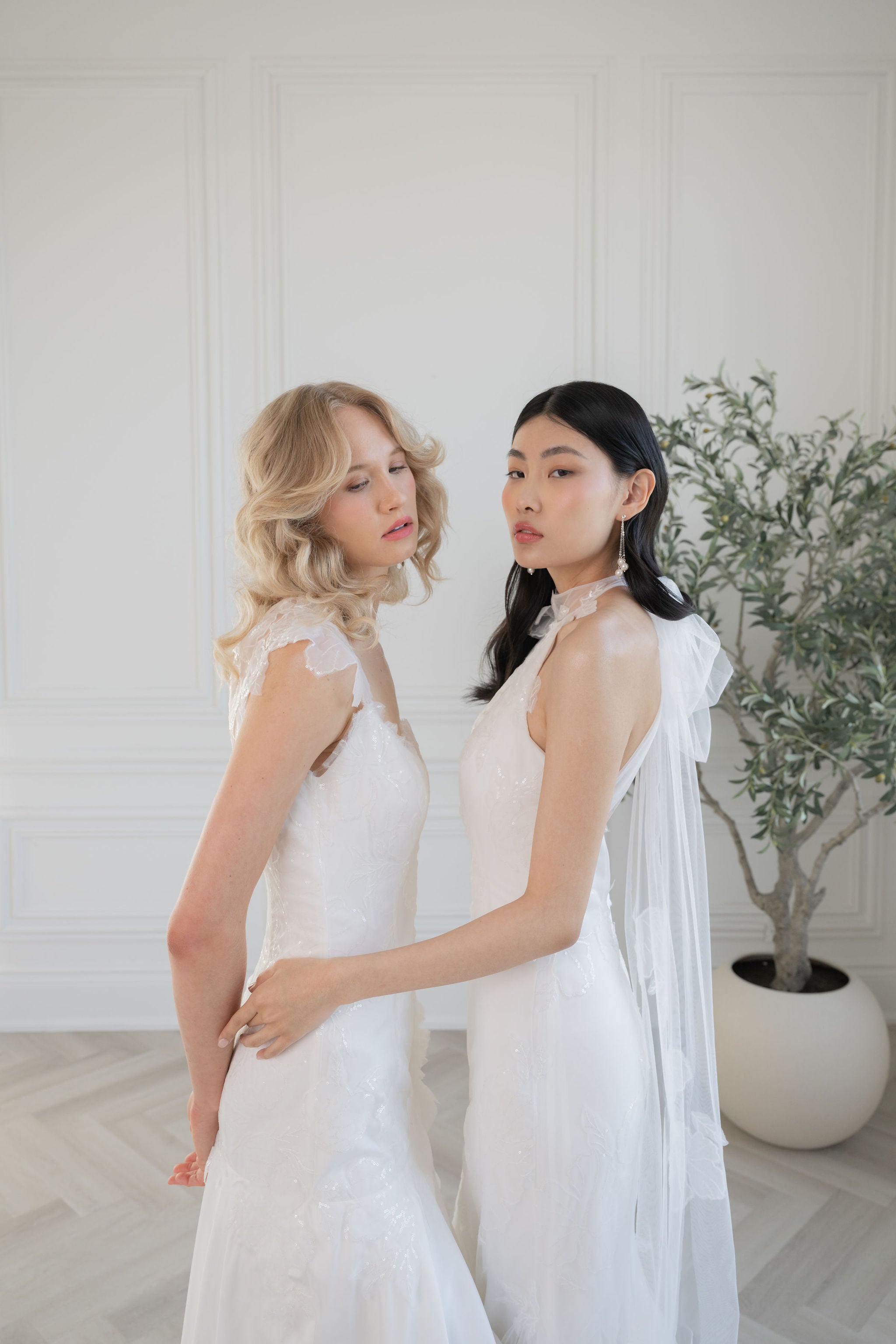 long silver chain strand earrings with large pearl drops for modern and classic canadian brides. 