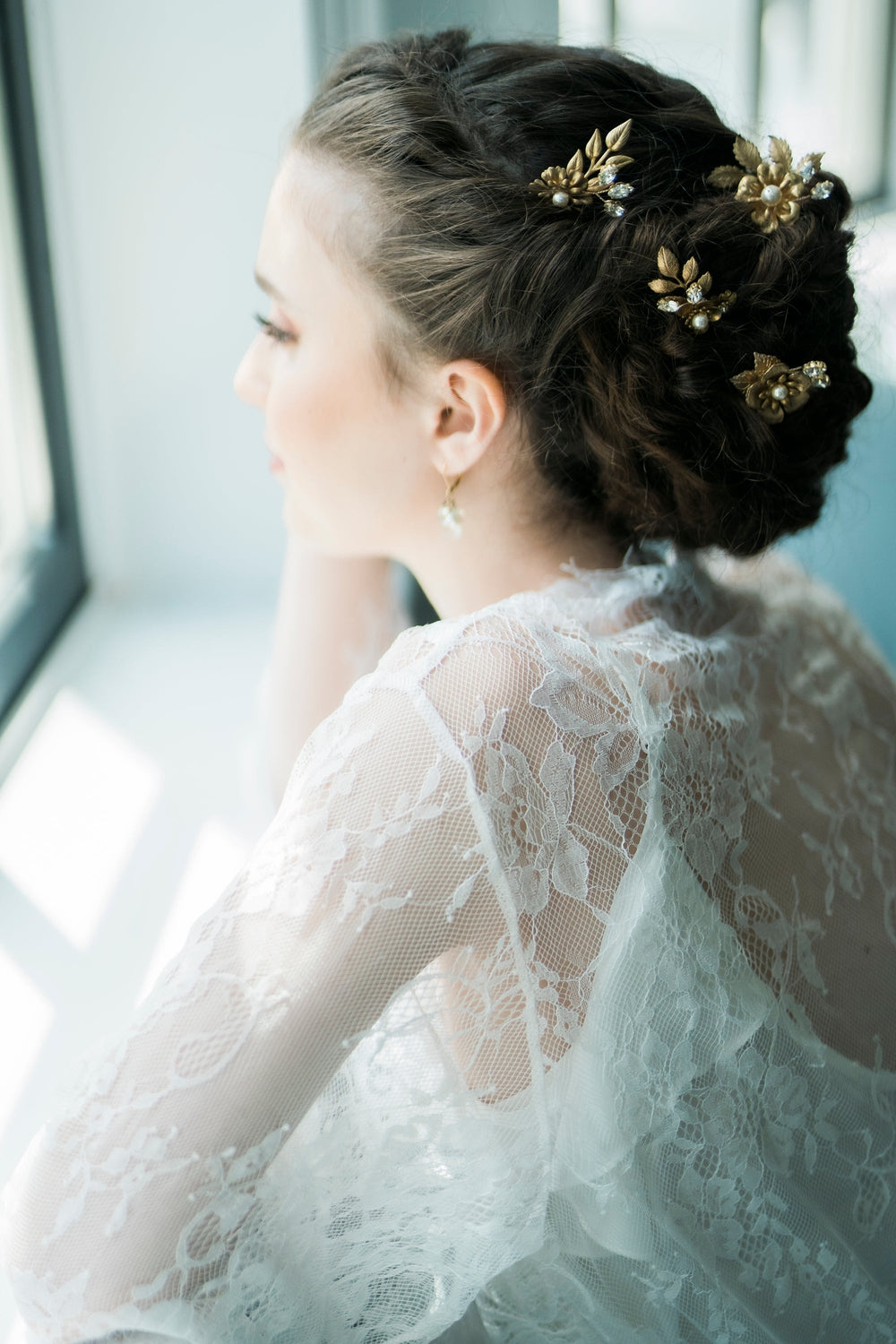 golden brass flower and leaf bridal hair pins with pearls and crystals. handmade in toronto canada by blair nadeau bridal
