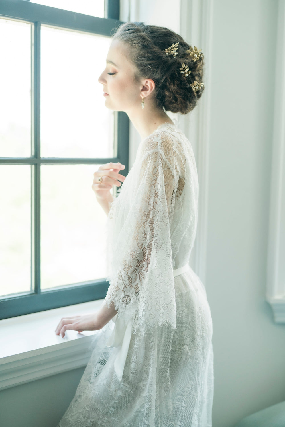 golden brass flower and leaf bridal hair pins with pearls and crystals. handmade in toronto canada by blair nadeau bridal
