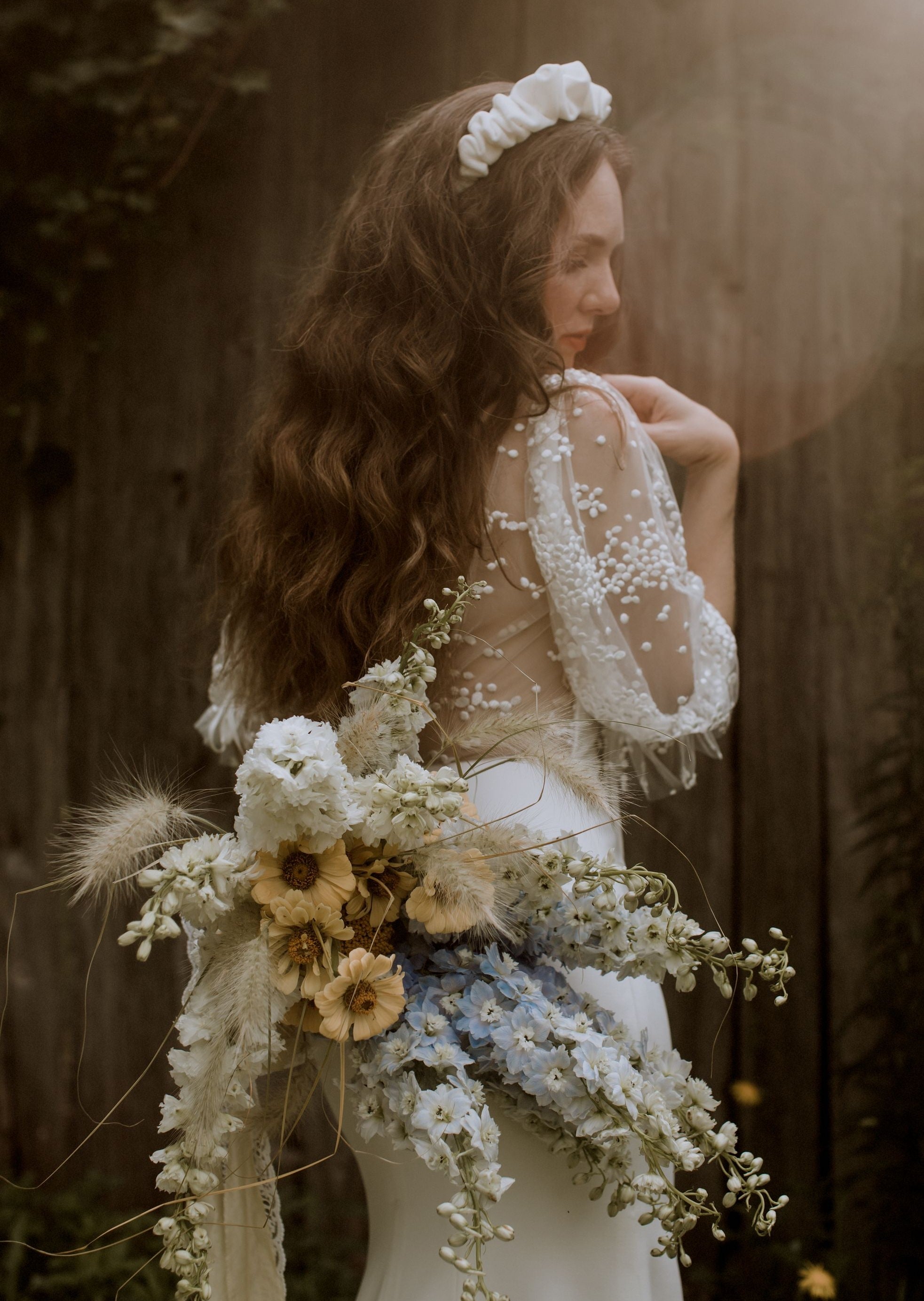 handsewn and gathered silk organza scrunched onto a grosgrain ribbon wrapped metal headband. This beautiful modern bridal hairband is available in ivory, white, black and a variety of other colours, just ask. Also available in velvet.  Handmade in Toronto Canada by Blair Nadeau Bridal Adornments. photography by Rust and Bark