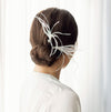 ivory feather and crystal bridal hair pins for wedding hairstyles. made in toronto canada by Blair nadeau bridal adornments