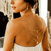 Gold draped shoulder necklace with round pearl drops in graduating sizes. handmade in toronto canada by blair nadeau bridal adornments