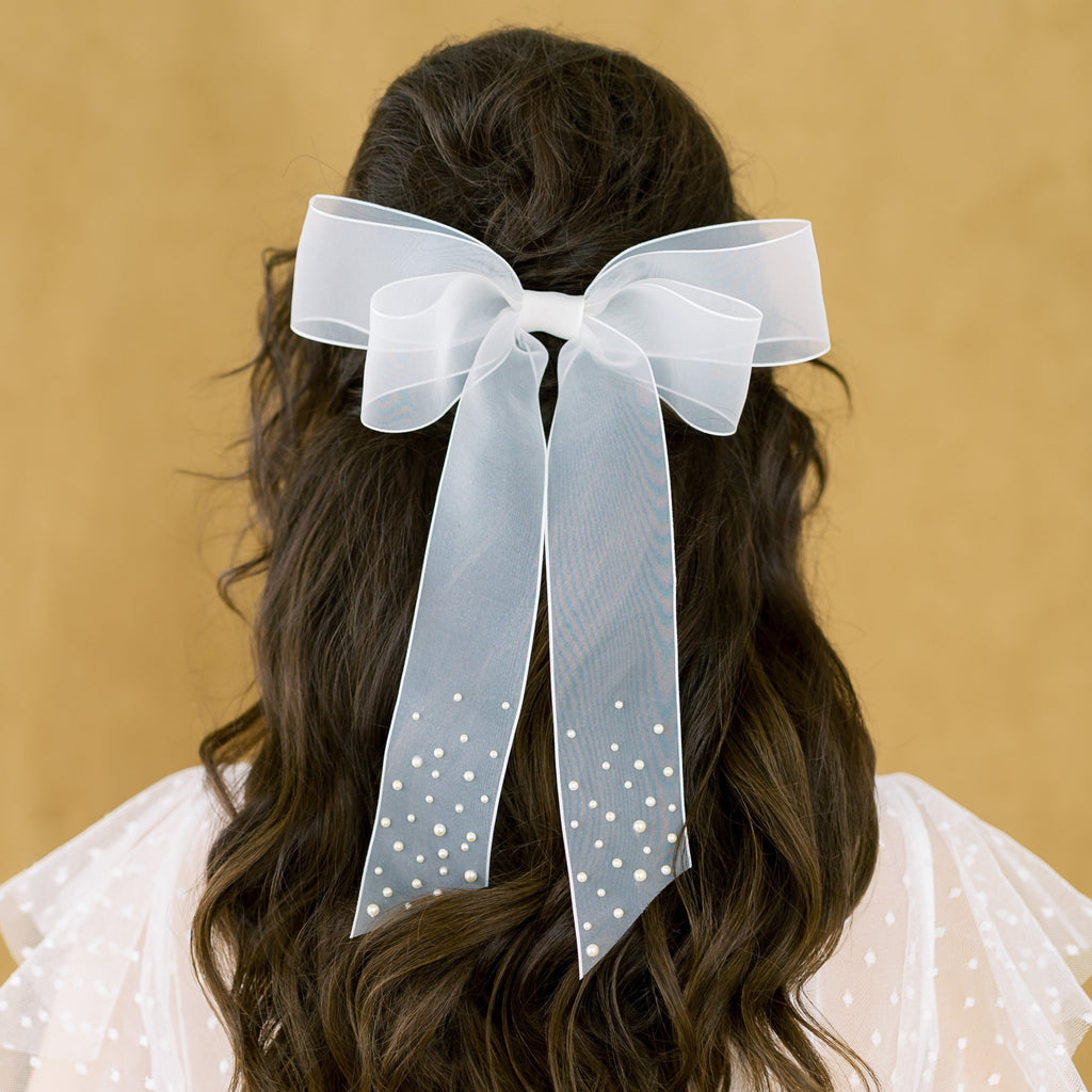 large romantic wedding off white pearl bow for wedding hairstyles. Handmade in Toronto Canada by Blair Nadeau Bridal Adornments