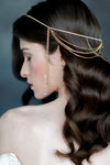 gold crystal rhinestone draped hair chain with dripping crystals at the side. handmade in toronto canada by blair nadeau bridal