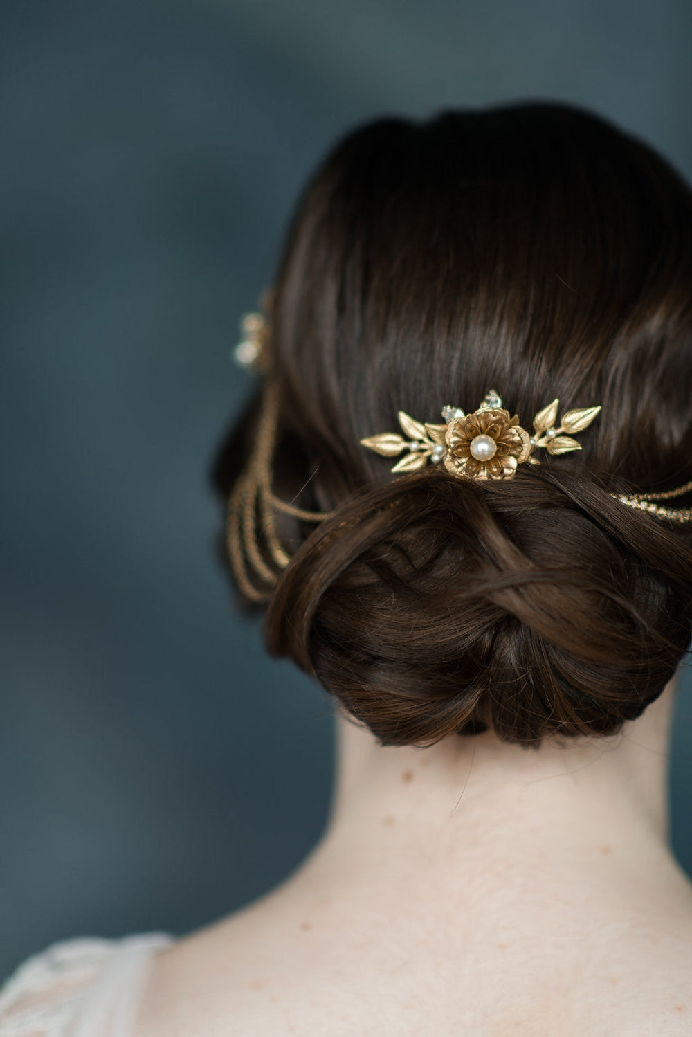 flower and leaf hair chain accented with crystals and pearls. handmade in canada by blair nadeau bridal