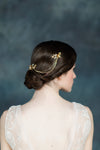 flower and leaf hair chain accented with crystals and pearls. handmade in canada by blair nadeau bridal