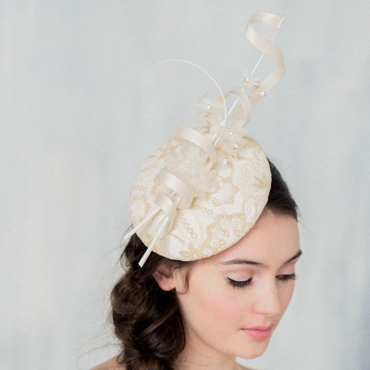 tall Gold & Ivory Lace Bridal Fascinator with silk ribbons, feathers and rhinestones. made in toronto canada by Blair nadeau bridal adornments