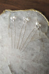 silver and white pearl small bridal hair pins with crystal rhinestones and glass pearls. handmade in toronto by blair nadeau