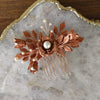 antique rose gold bridal hair comb with ivory pearls and leaves and roses. handmade in toronto canada by blair nadeau bridal