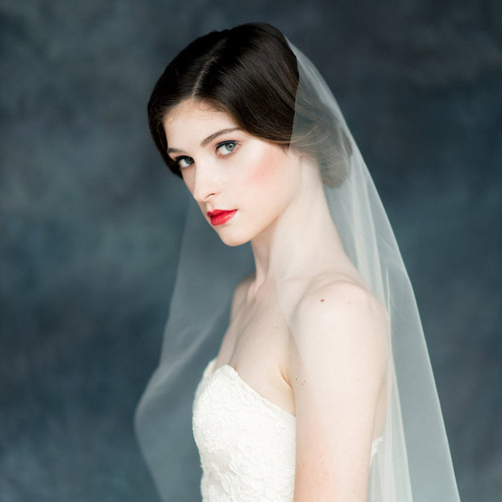 white single tier oval cut raw edge chapel length wedding veil for brides. made in toronto canada by Blair nadeau bridal adornments
