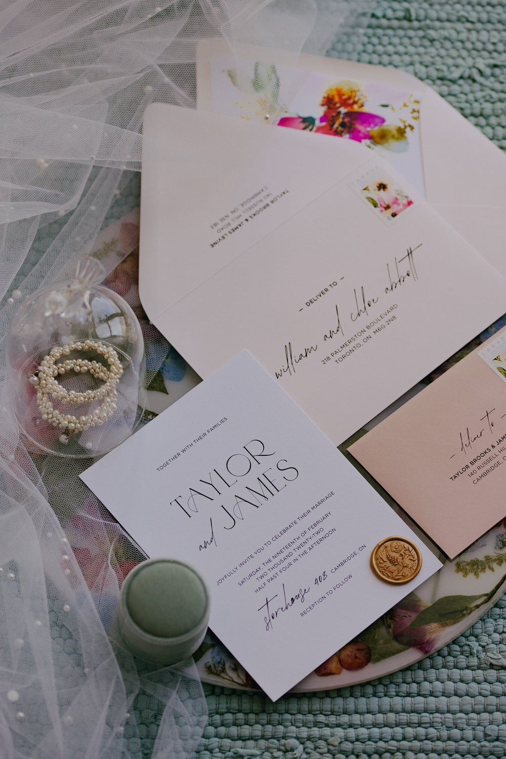 stationary suite with pearl veil and pearl earrings