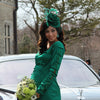 statement emerald green wedding fascinator for brides