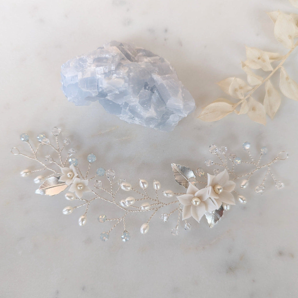 silver bridal hair vine with leaves and clay flowers. handmade in toronto by blair nadeau