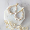 large pearl teardrop earrings in gold and ivory for weddings or everyday