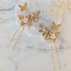 golden butterfly bridal hair pins with clay flowers for weddings