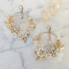 large gold statement bridal hoop earrings with pearls and flowers. 