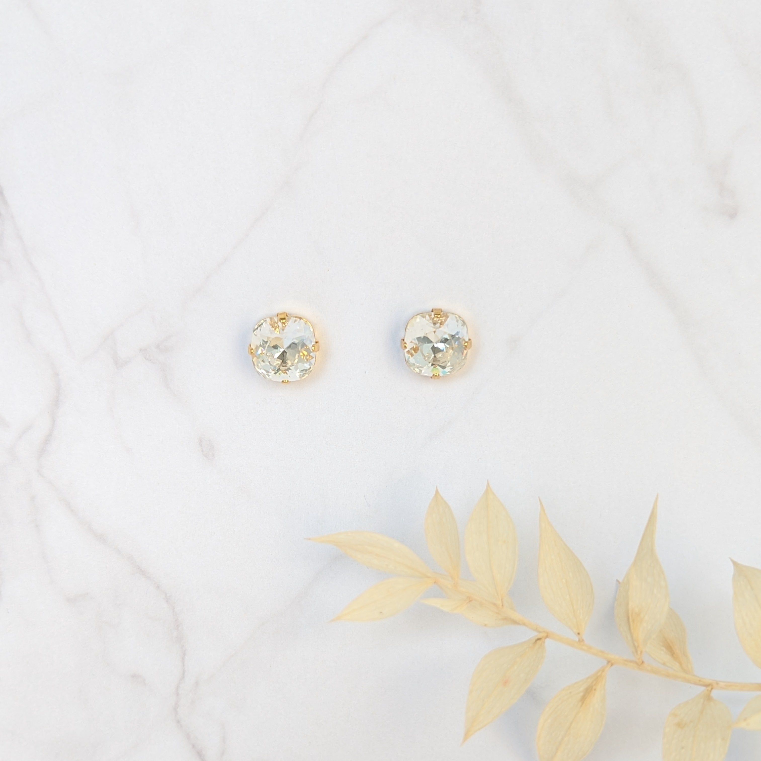 simple large crystal cushion cut bridal earrings for minimalist wedding dresses