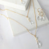 crystal bridal back necklace with matching earrings for weddings