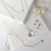 rose gold briolette crystal bridal jewelry. Back necklace, earrings and bracelet. Handmade in Toronto Canada by Blair Nadeau Bridal Adornments