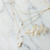 gold layered bridal necklace with freshwater pearls
