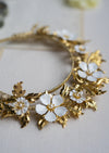 gilted gold wedding headpiece with white flowers