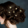 celestial hair pins for bridal updo with stars & and crystals and available in silver, gold, rose gold with white, ivory, blush, iridescent pearls and clear, white opal or aurora borealis crystals