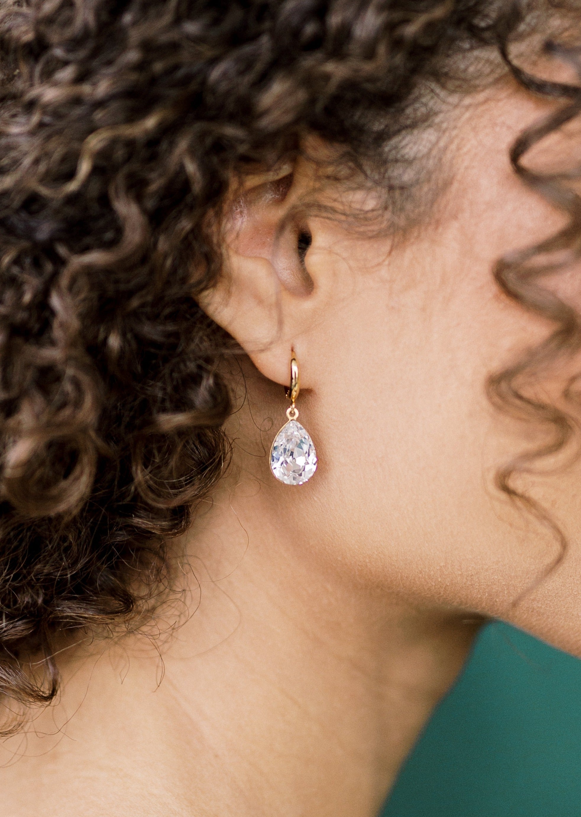 modern bridal hoop earrings with large crystal teardrops for modern brides