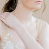 single strand bridal bracelet with tiny freshwater pearls for brides handmade in toronto canada by blair nadeau bridal