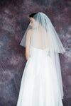 waltz length white wedding veil with full blusher