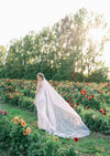 spring garden wedding with long wide chapel length wedding veil
