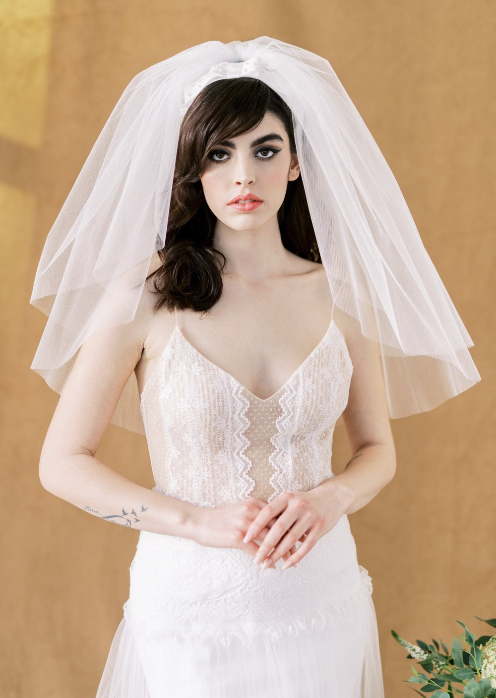 Short full volume double tier wedding veil with pearl hairbow headband