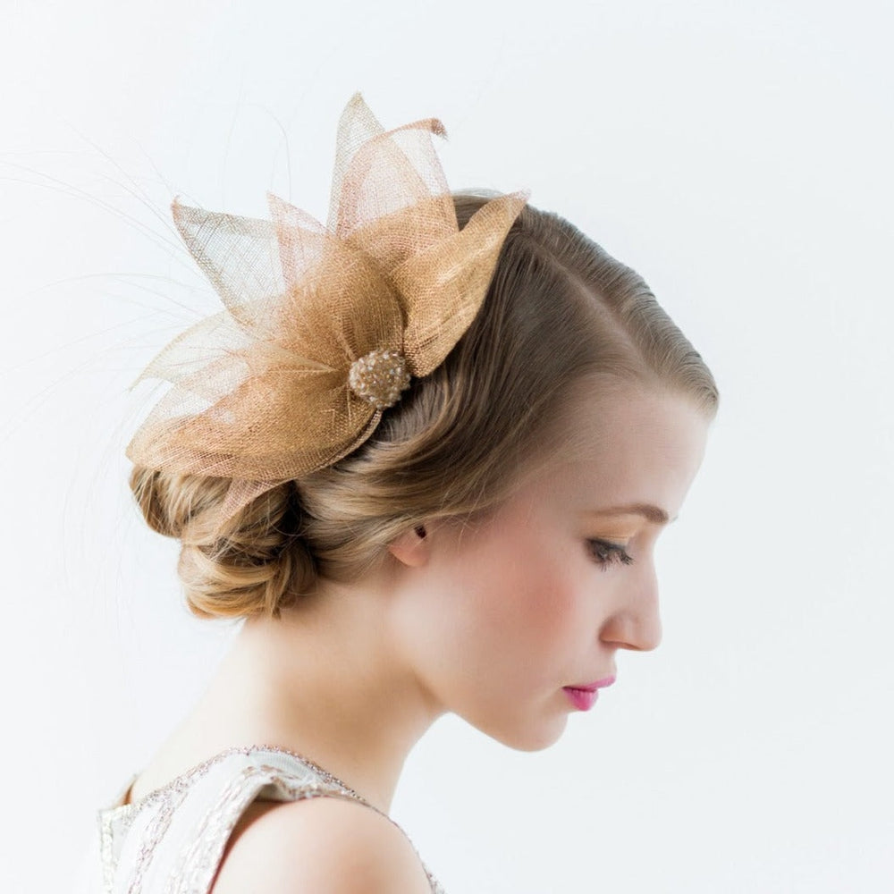gold bridal fascinator made of sinamay with feathers and crystals,made in toronto canada by Blair nadeau bridal adornments