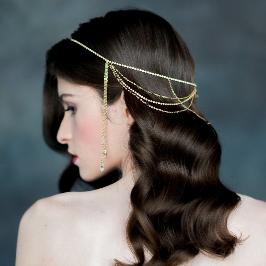gold crystal rhinestone draped hair chain with dripping crystals at the side. handmade in toronto canada by blair nadeau bridal