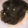 small gold bridal hair pins with crystal rhinestones and glass pearls. handmade in toronto by blair nadeau