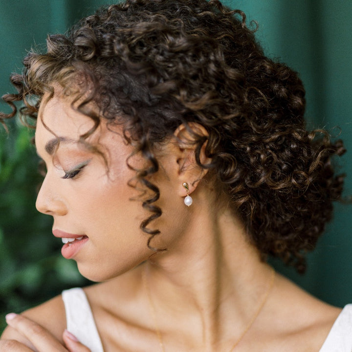 small freshwater pearl drop earrings with teardrop studs. Available in silver, gold or rose gold plated. handmade in toronto ontario canada, by Blair Nadeau Bridal Adornments