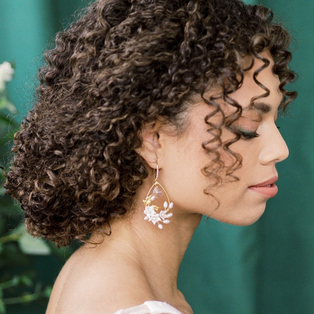 small teardrop earrings with clay flowers, freshwaters pearls and plated meatl leaves. Drop crystals in centre of earrings for extra sparkle. handmade in toronto ontario canada - blair nadeau bridal adornments available in silver or gold. handmade in toronto canada by blair nadeau bridal adornments