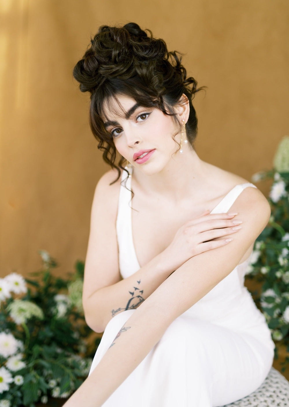 long paper clip chain style earrings with pearl drops. Ear huggy style. Modern bridal accessories for brides