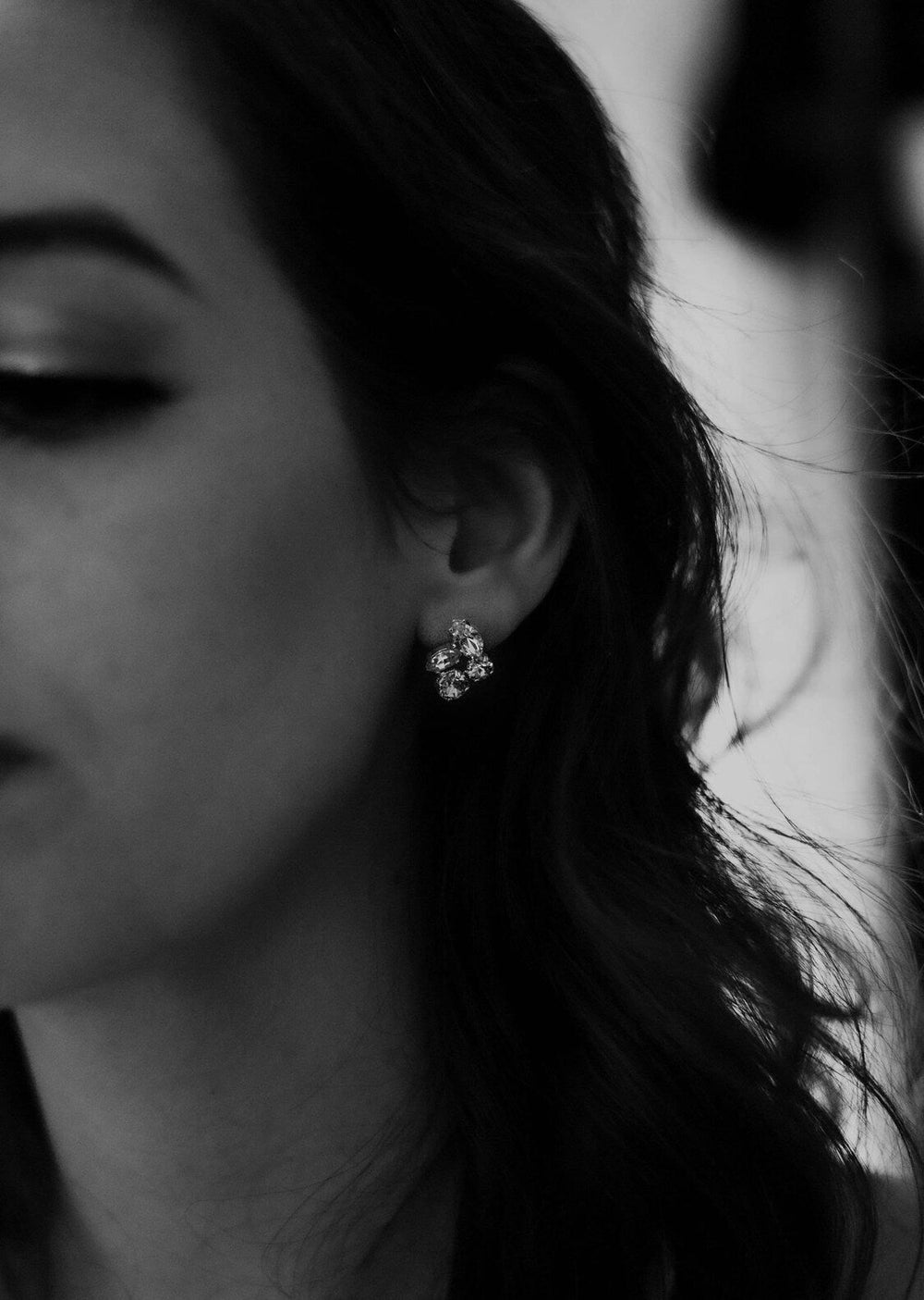black and white photo of crystal stud earrings for brides