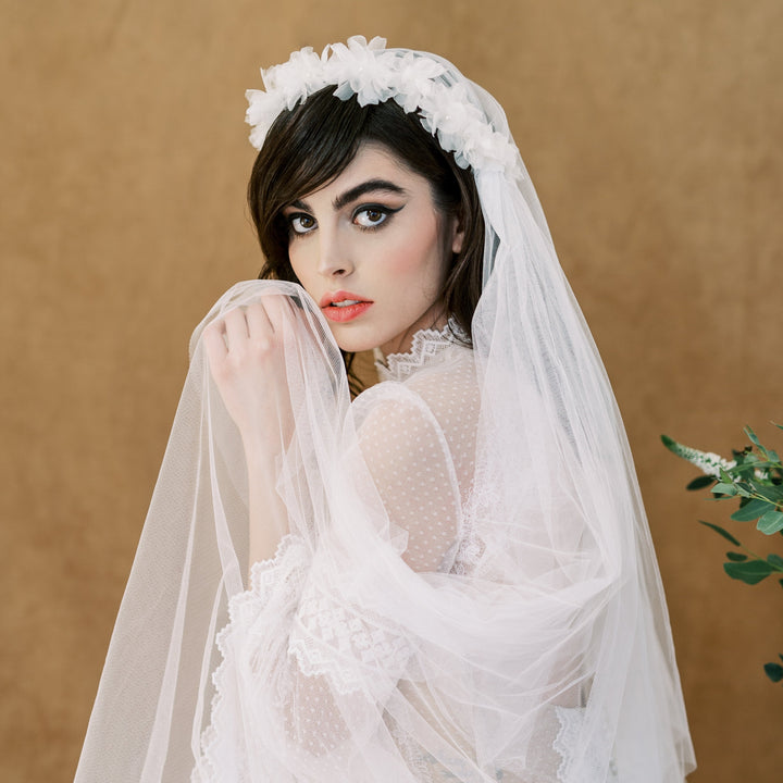 Ivory or White handpressed silk flower crown with pearls are handstitched to a beautiful soft bridal netting. This beautiful juliet veil is delicately gathered at the sides for a beautiful fitted cap.  A double layer can be worn as a blusher. handmade in toronto ontario canada by Blair Nadeau Bridal Adornments 