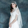 Ivory soft tulle draped net juliet veil with pom pom trim and white opals. handmade in canada by blair nadeau