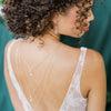 three tier layered crystal and pearl bridal back necklace with matching crystal and pearl earrings. Available in silver, gold and rose gold with white or ivory pearls. Handmade in Toronto Canada by Blair Nadeau Bridal Adornments