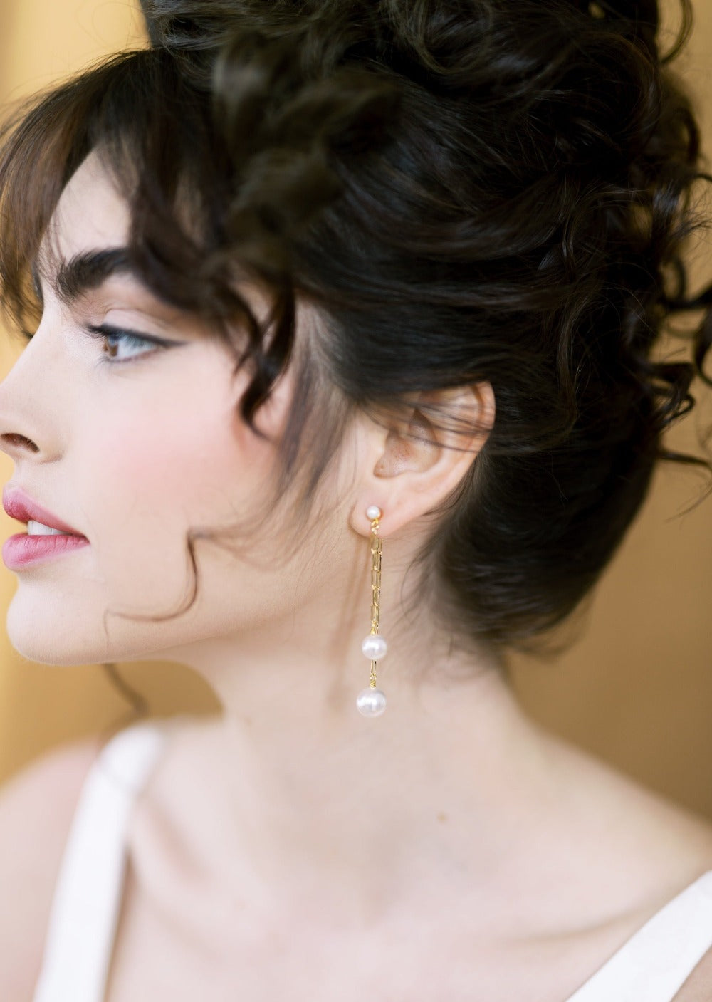 long paper clip chain style earrings with pearl drops. Ear huggy style. Modern bridal accessories for brides