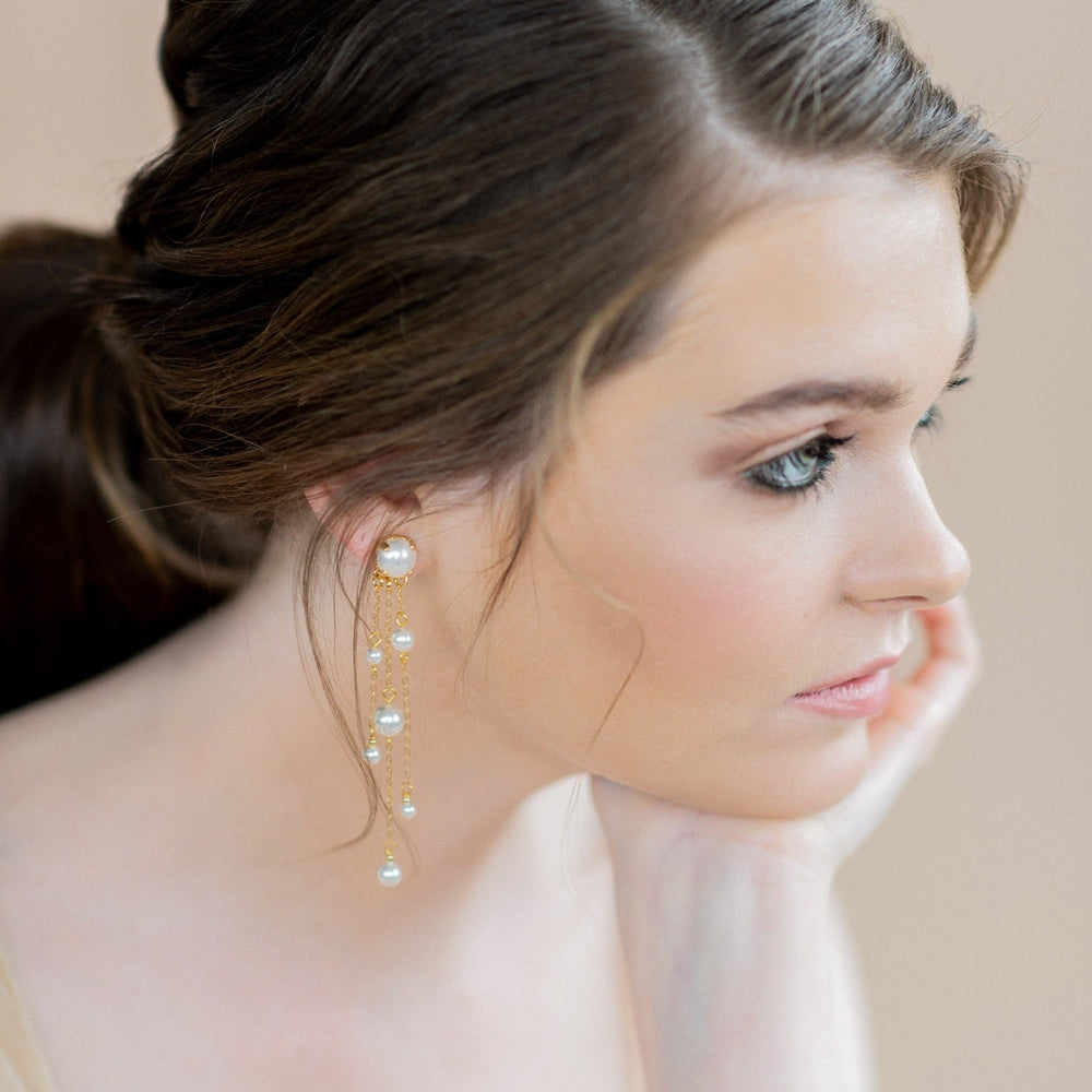 large pearl stud earrings with long drapes of pearls and chains. made in toronto canada by Blair nadeau bridal adornments